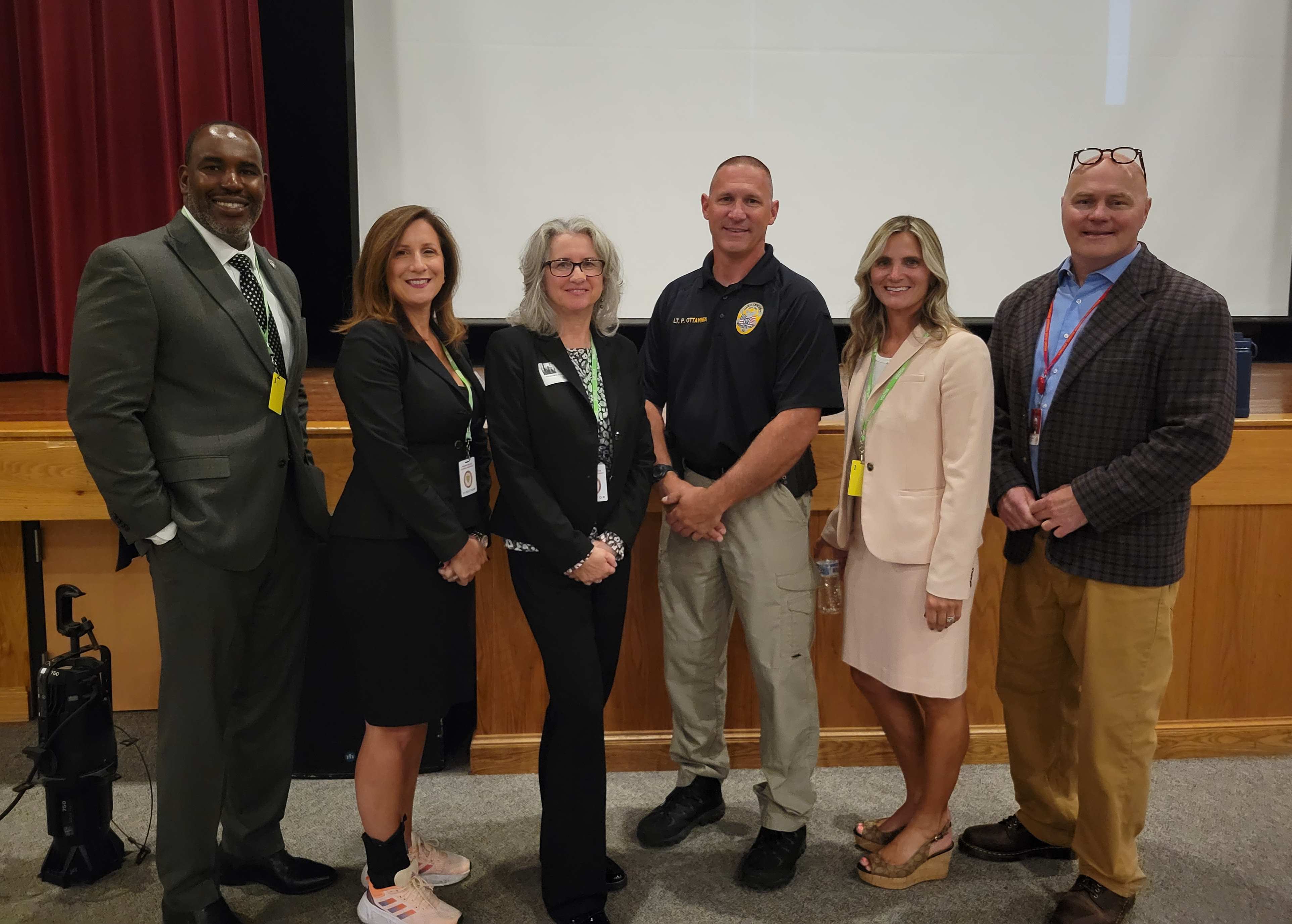 Morris County Prosecutor’s Office Sgt. Patrick Laguerre, Chief Assistant Prosecutor Tia Manochio, First Assistant Prosecutor Maggie Calderwood, Mount Olive Police Lt. Paul Ottavinia, Supervising Assistant Prosecutor Samantha DeNegri, Principal Kevin Stansberry